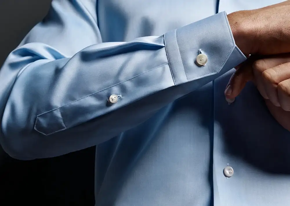 blue colored mens tailored shirt with button